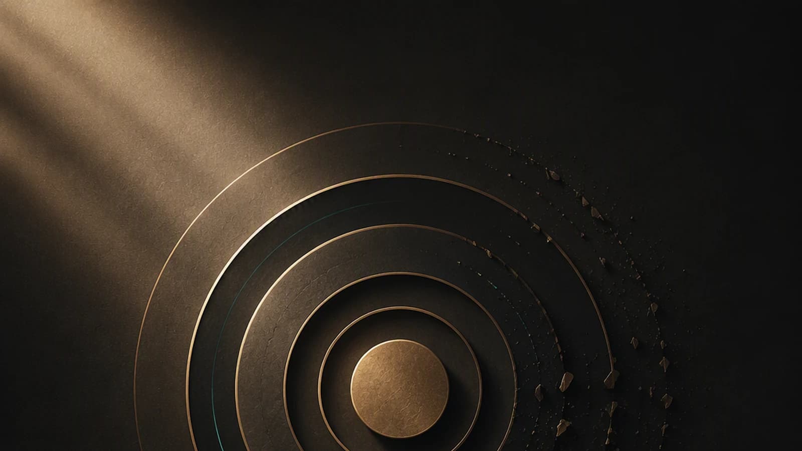 Cercles concentriques dorés sur fond noir avec une lumière accentuée.